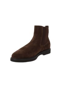 Bottines Chelsea en suède marron avec semelle noire et panneaux latéraux élastiques, design haut de la cheville, adaptées pour un look décontracté ou formel.