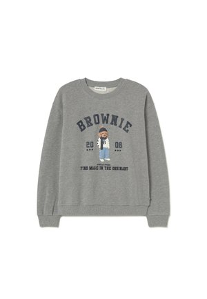 Grauer Pullover mit Rundhalsausschnitt, mit einer zentralen Grafik eines Cartoon-Charakters in blauer Kleidung und Text in Marineblau: "BROWNIE 2006."