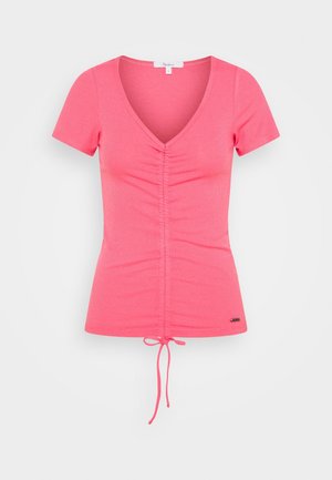 Lyserød ribbet T-shirt med korte ærmer og V-hals, samlet frontdetalje og justerbar snøre i kanten. Har logodetalje forneden.