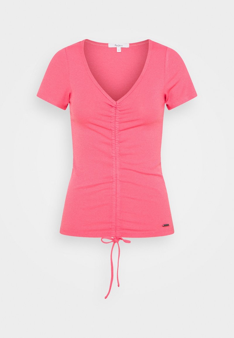 Różowa, prążkowana koszulka z krótkim rękawem, z dekoltem w serek, z marszczonym przodem i regulowanym wiązaniem na dole. Posiada detal logo na dole.
