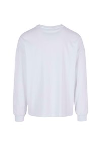 White long-sleeve shirt with a round neckline, made of soft fabric. Features slightly puffed sleeves and fitted cuffs. No visible patterns.
