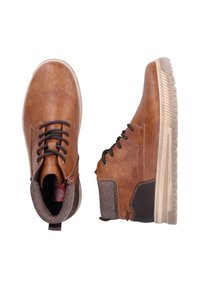 Brown leather ankle boots with a textured finish, lace-up design, contrasting dark brown accents, and a light-colored rubber sole.