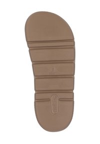 Brown rubber shoe outsole with textured grooves and ridges. Features a logo and size marking (36-37) at the center.