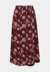 Langer burgunderfarbener Rock mit einem Blumenmuster aus weißen Blumen und schwarzen Blättern. Er hat einen elastischen Bund und Knopfdetails an der Vorderseite.