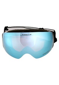Oakley slidinėjimo akiniai su dideliu cilindriniu mėlynu tonu lęšiu ir juodu putplasčio paminkštinimu ant rėmo. Turi reguliuojamą elastingą juostą.