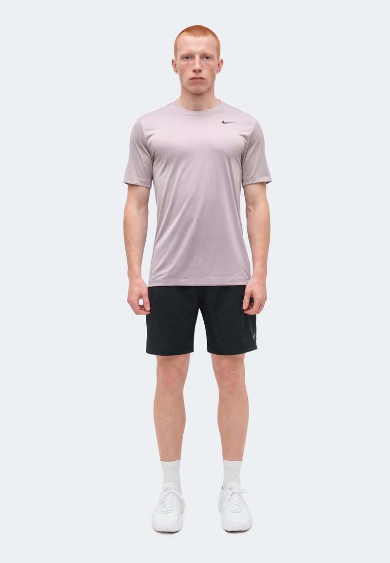 Nike Performance TEE RESET - Sportovní tričko - light violet ore/black