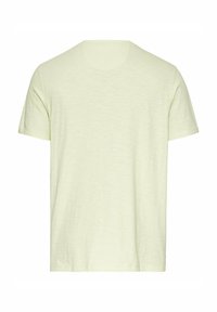 Lys gul kortærmet T-shirt lavet af et blødt stof. Har en rund halsudskæring og en afslappet pasform med en subtil tekstureret overflade.