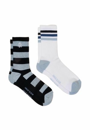 One pair of black and gray striped socks and one pair of white socks with blue and black stripes at the top, both with gray toes and heels.