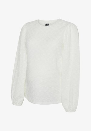 Hvid langærmet bluse lavet af struktureret stof, med en rund halsudskæring og samlede detaljer ved skuldrene.