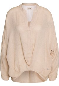 Maglione beige con texture, scollo a V e vestibilità ampia. Spalle abbassate, maniche larghe e orlo curvo. Presenta un piccolo dettaglio del logo.