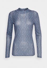 Maglia a maniche lunghe realizzata in tessuto trasparente, con uno sfondo blu navy e un piccolo motivo floreale blu. Presenta un colletto alto e rotondo.