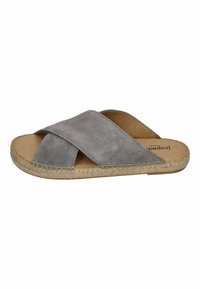 Gray suede slide sandals with crossed straps, woven jute sole, flat footbed, and minimal design. Interior features brand logo.