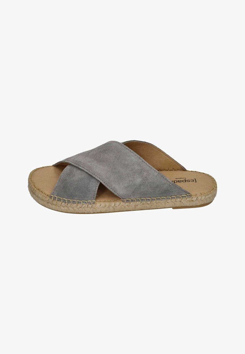 Gray suede slide sandals with crossed straps, woven jute sole, flat footbed, and minimal design. Interior features brand logo.