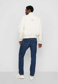 Tommy Hilfiger REVERSIBLE VARSITY JACKET - Bomber Jacket - calico