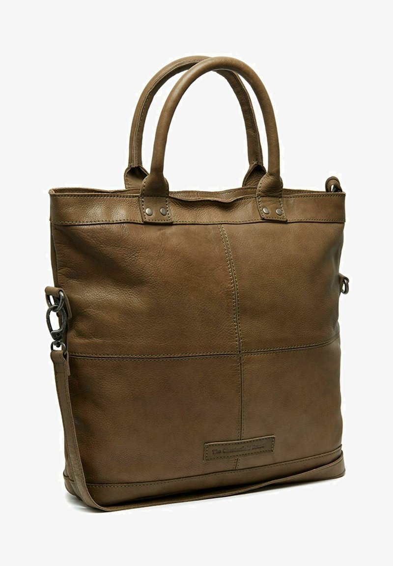 Borsa a spalla in pelle marrone con doppi manici, tracolla removibile e dettagli di cucitura visibili su uno sfondo neutro.