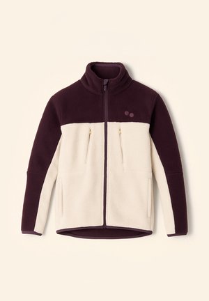 Fleecejacke mit hohem Kragen. Dunkelvioletter Oberteil- und cremefarbener Unterteilbereich. Verfügt über goldene Reißverschlusstaschen und ein kleines Logodetail.