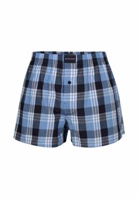 Un short en boîte à carreaux bleus, présentant des nuances variées de bleu, noir et blanc. Taille élastique avec un bouton de fermeture à l'avant.
