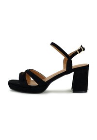 Black suede sandal with a wide, chunky heel and crisscross strap design. Features adjustable ankle strap and smooth interior lining.