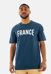 le coq sportif Camiseta estampada - bleu