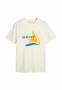 Crème katoenen t-shirt met een grafiek van een blauw-gelig zeilboot en de tekst "GANT Sailing". Klassieke ronde hals met korte mouwen.