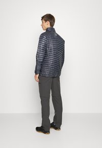 Norrøna TROLLVEGGEN SUPERLIGHT JACKET - Casaco de penas - cool black