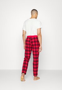 Björn Borg CORE PYJAMA PANTS - Calças de pijama - red/black