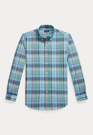 Camisa com botões em padrão xadrez azul e verde, com mangas compridas, gola e um pequeno logótipo no peito. Tecido misto de algodão.