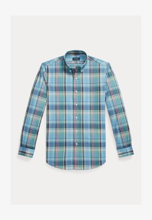 Camisa com botões em padrão xadrez azul e verde, com mangas compridas, gola e um pequeno logótipo no peito. Tecido misto de algodão.