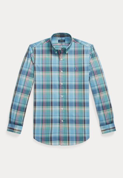 Button-down shirt in blue and green plaid pattern, featuring long sleeves, a collar, and a small logo on the chest. Cotton blend fabric.