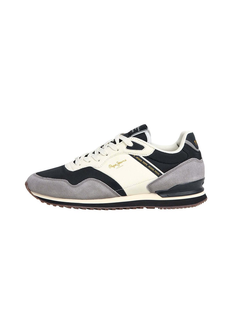 Black, gray, and cream athletic sneaker featuring a suede and mesh upper, lace closure, padded collar, and rubber sole with brown traction.