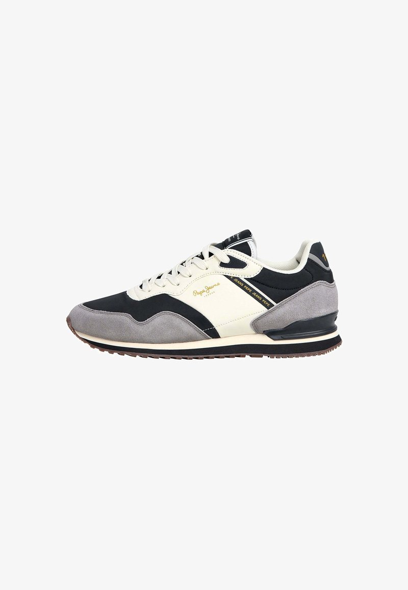 Black, gray, and cream athletic sneaker featuring a suede and mesh upper, lace closure, padded collar, and rubber sole with brown traction.