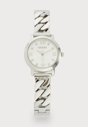 Montre en argent ronde avec un cadran blanc, marqueurs en chiffres romains et un bracelet à chaîne. Comprend de petites pierres décoratives sur le cadran.