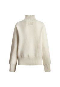 Ljusbeige ribbad polotröja med långa ärmar och avskalat passform. Har subtil märkning i nacken bak. Mjuk textur.