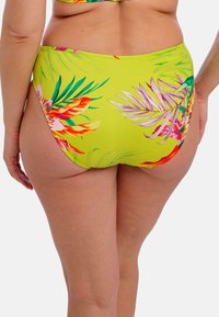 Zelené spodní díly bikin s tropickým květinovým vzorem v živých barvách jako růžová, oranžová a žlutá s hladkým, elastickým povrchem.