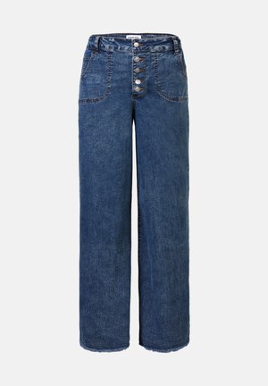Vidje jeans i mørkeblå denim. Har knappestolpe, fem lommer og frynset kant. Glatt tekstur med synlige sømmer.