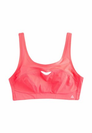 Roze sportbeha van gladde stof, met een ronde uitsnede in het midden, brede schouderbanden en gestikte details. Driehoekig logo aan de zijkant.