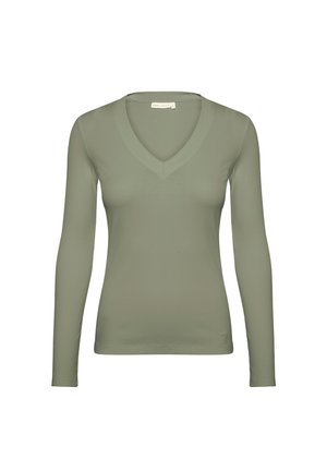 Langärmliges, V-Ausschnitt-Oberteil in Olivgrün, aus geripptem Stoff. Bietet eine taillierte Silhouette und ein dezentes Markenlogo am Saum.