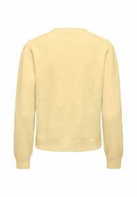 Kollane pullover-särk pikkade varrukatega, ümmarguse kaelusega ja soonikuga äärega. Pehme tekstuur ja lihtne, puhas disain.