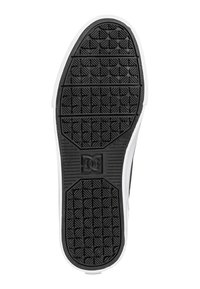Black rubber sneaker sole featuring a textured grip pattern and white side stitching, with a logo centered on the rear section.