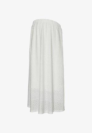 Balta, līdz ceļiem gara svārku ar savirpinātu elastīgu jostu. Iespējas teksturēta auduma ar perforētām rakstām zīmēm apakšējā malā.