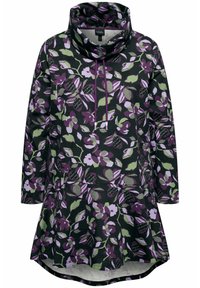 Túnica floral en verde oscuro, con grandes patrones florales en púrpura y verde, cuello vuelto, mangas largas y un dobladillo acampanado.