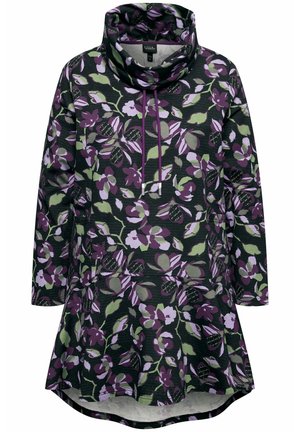 Bloemen tuniek in donkergroen, met grote paarse en groene bloemmotieven, col hals, lange mouwen en een uitlopende zoom.