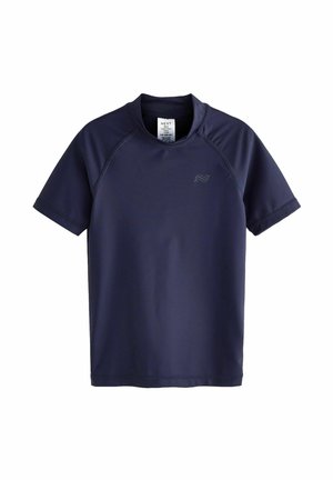 Rash guard à manches courtes bleu marine, fabriqué en tissu lisse et extensible. Doté d'un col rond et d'un léger détail de logo près de la poitrine.