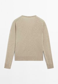 Helles beige Langarmshirt mit Rundhalsausschnitt, gerippten Bündchen und Saum. Weiche Textur ohne Muster oder zusätzliche Akzente.