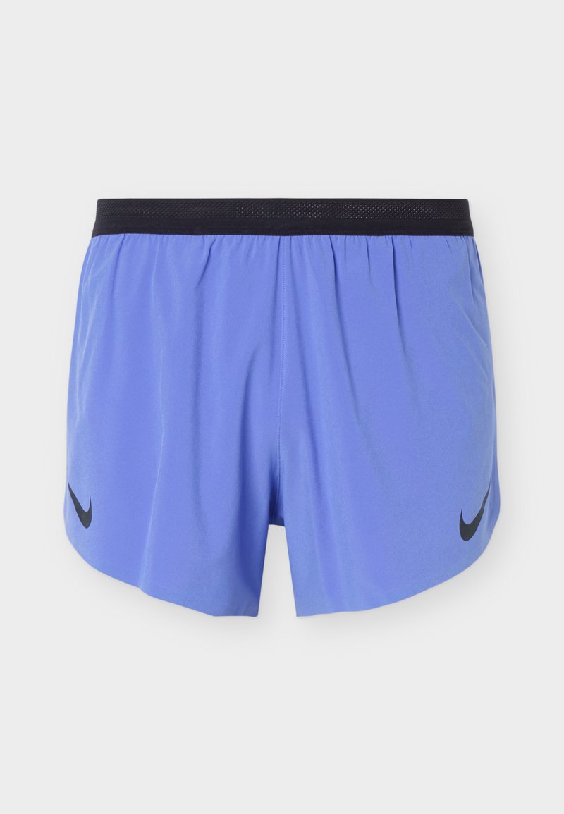 Light blue athletic shorts with a black waistband and black Nike Swoosh logos on both sides, displayed against a plain background.