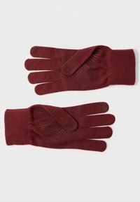 Bordové pletené rukavice s rebrovaným manžetom, majúce viacero prstov a bezšvový, jemne textúrovaný dlaňový detail pre lepší úchop.