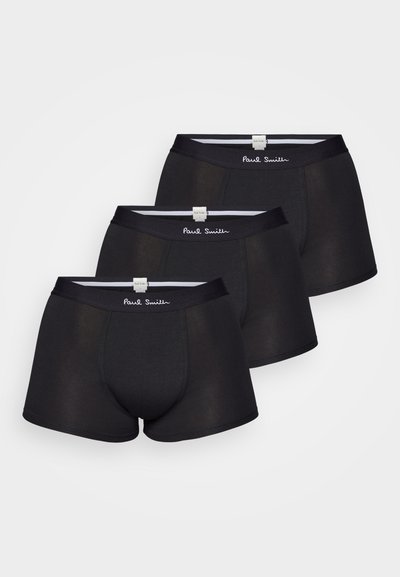 Un pack de trois boxers noirs. Fabriqués en tissu doux avec une ceinture élastique transparente arborant le logo "Paul Smith".