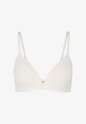 Biały bezprzewodowy biustonosz o gładkiej, matowej fakturze. Posiada głęboki dekolt w kształcie litery V oraz mały złoty zdobnik na środku. Regulowane ramiączka.