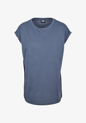 Zilā kokvilnas t-kreklu īsām piedurknēm ar apaļu kakla izgriezumu un sānu šķēlumiem, ar gludu tekstūru un vienkāršu dizainu. Redzama zīmola birka.