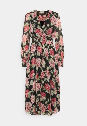 Robe midi noire à imprimé floral rose et blanc, manches longues bouffantes, taille smockée et décolleté en V.